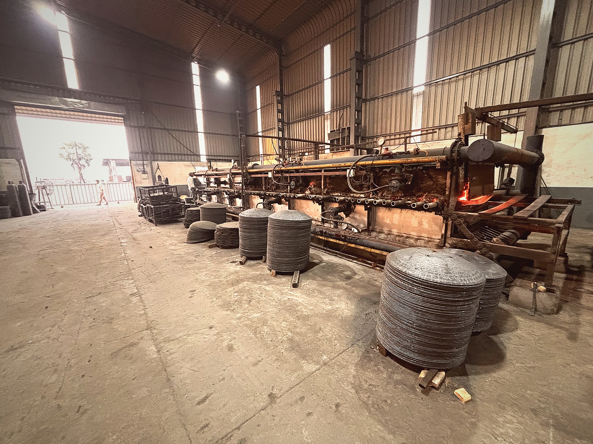 8-zone conveyor furnace in operation with disc blade stacks
