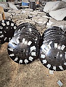 Notched disc blades stacked in production