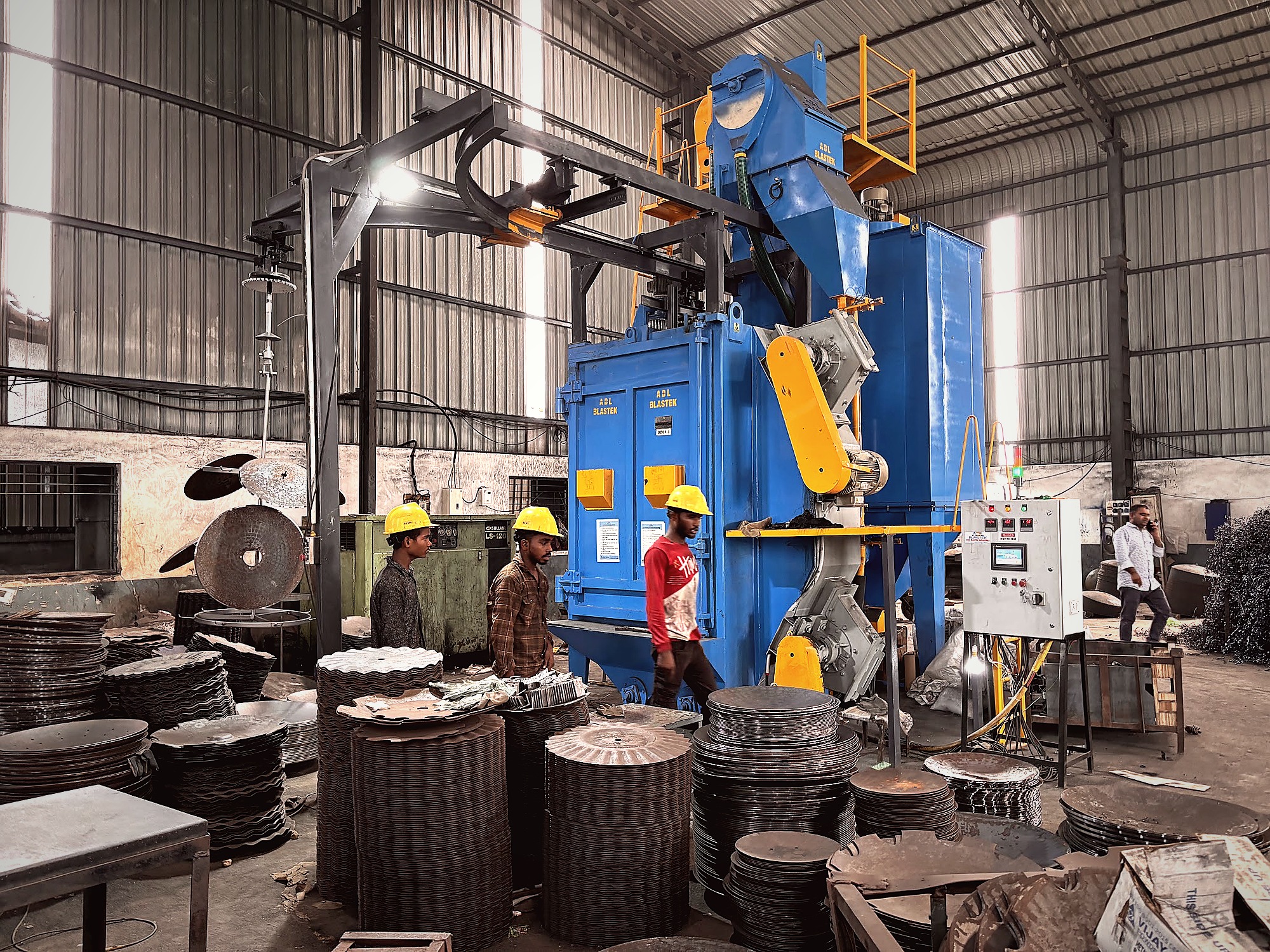ADL Blastek shot blasting machine with disc blade stacks
